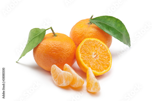 tangerines with slice and segments, on white background