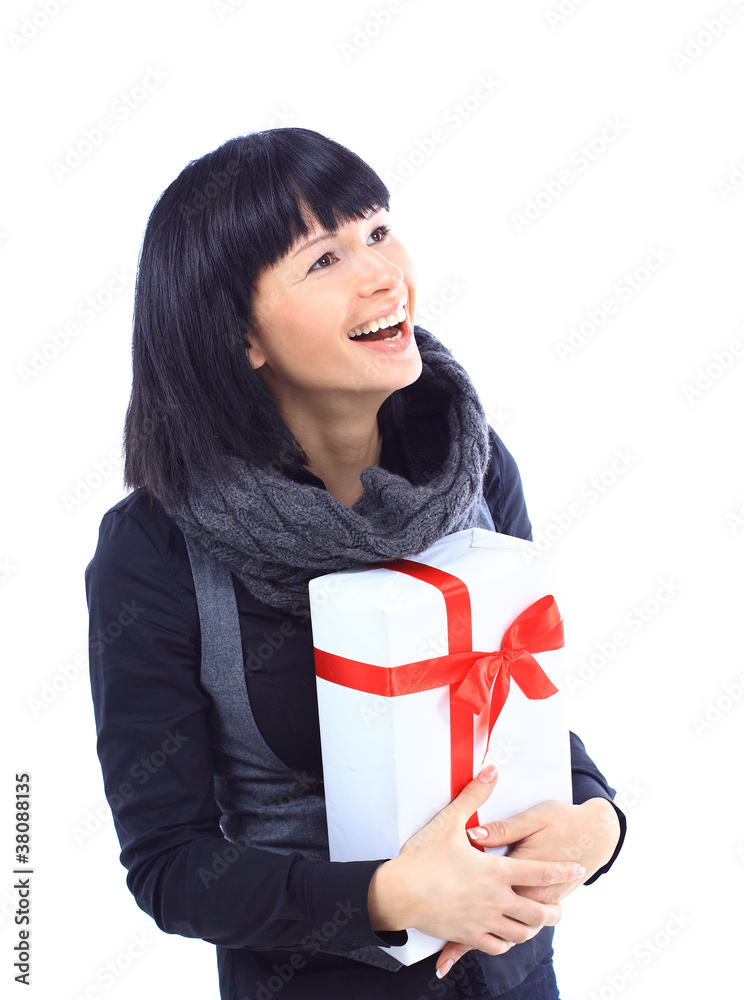 Beautiful business woman holding a gift isolated Beautiful business woman holding a gift isolated