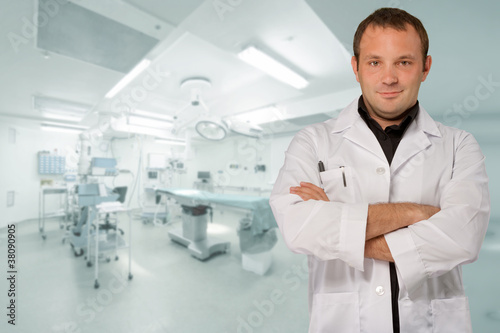 Reassuring male doctor in operating room