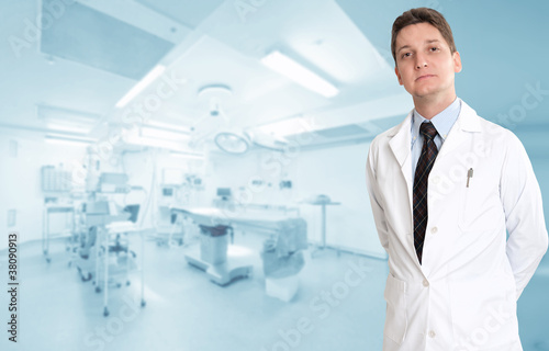 Serious male doctor in operating room