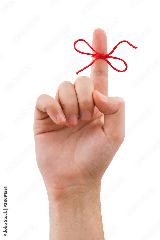 Red bow on finger