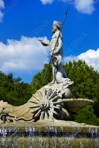 The fountain of Neptune in Madrid, Spain photo