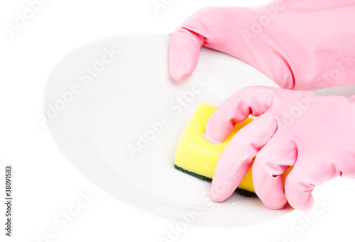 hands in glove with latex holding sponge and bowl