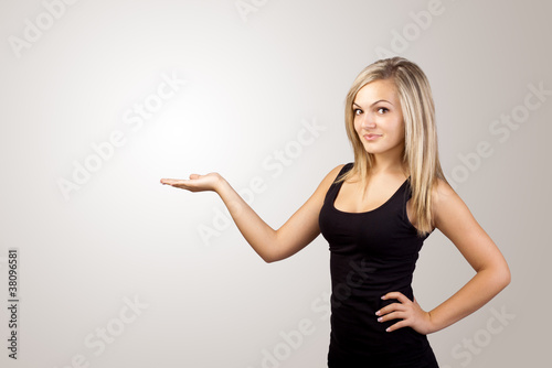 blonde woman presenting hand