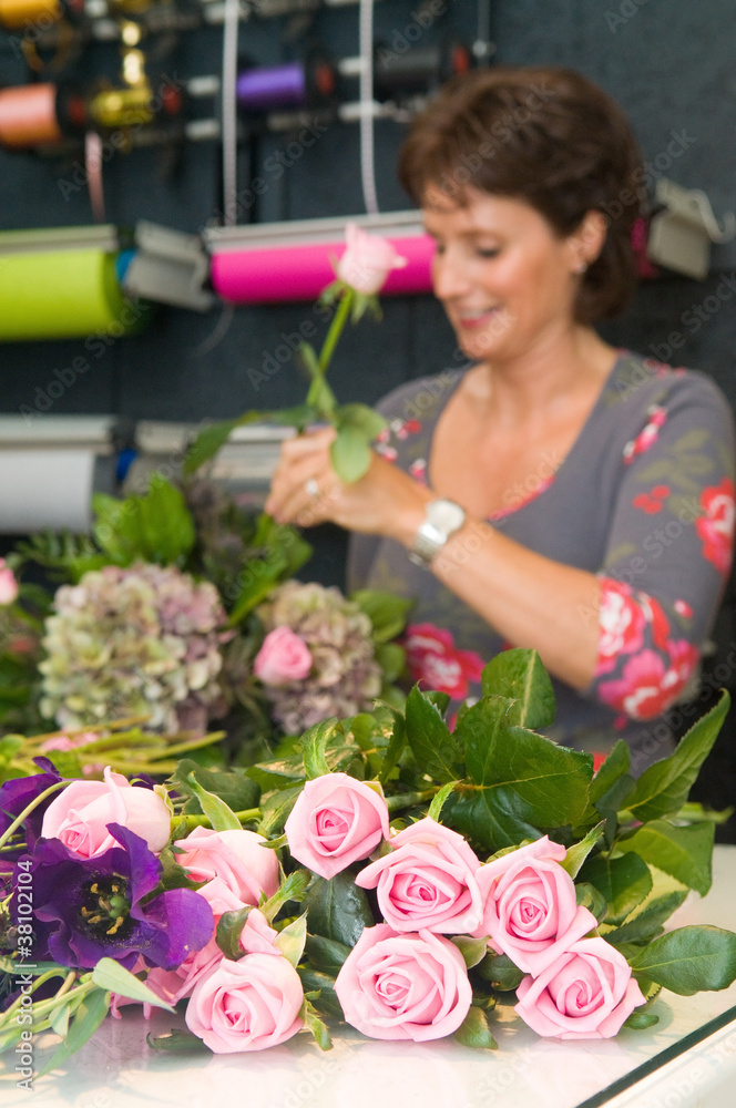 Florist working in a store Florist working in a store