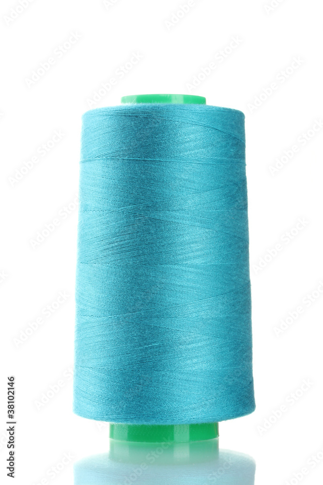 Blue bobbin thread isolated on white Blue bobbin thread isolated on white
