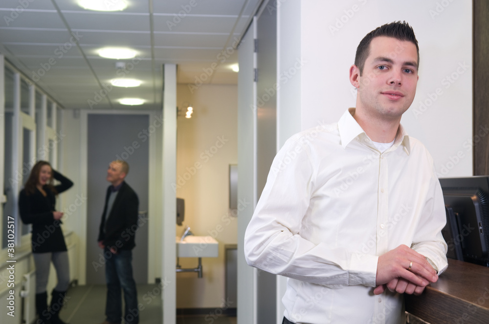 Young Businessman with Colleagues Young Businessman with Colleagues