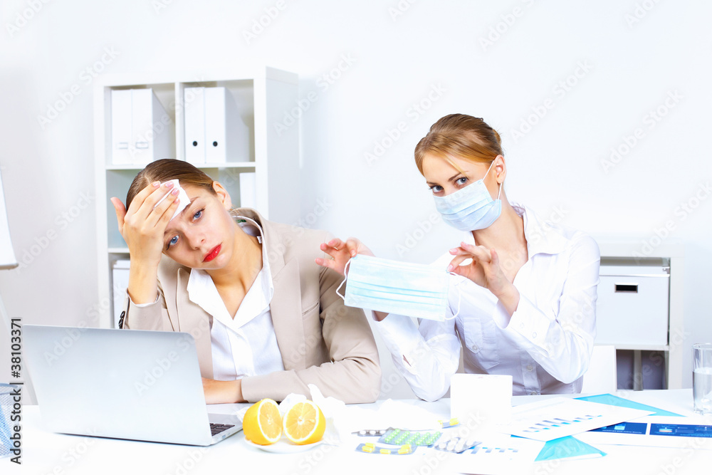 Fototapeta premium People with cold and flu at work place