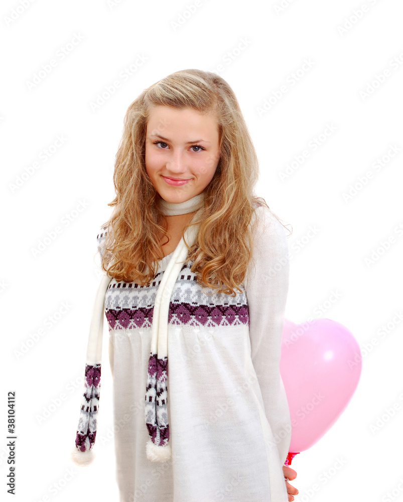 shy teenage girl hiding a heart ballon behind shy teenage girl hiding a heart ballon behind