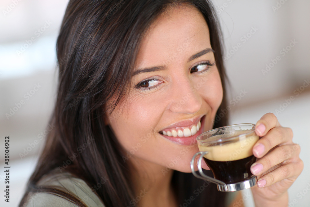 Portrait of beautiful woman drinking expresso Portrait of beautiful woman drinking expresso