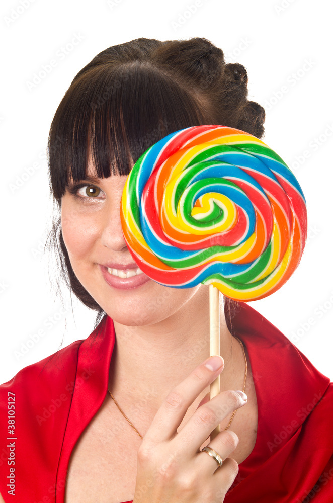 Young woman with lollipop isolated on white