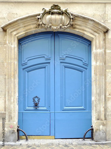 A blue door in Paris #38105512