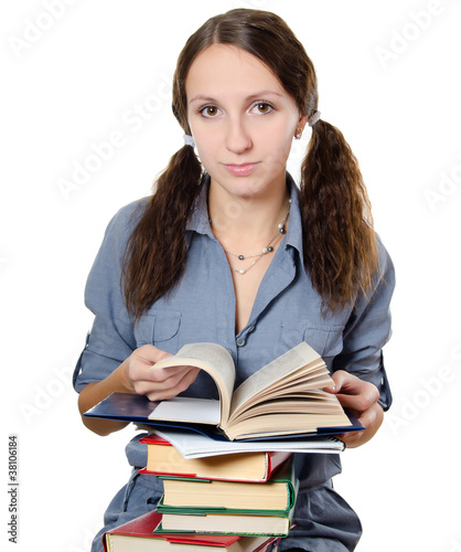 The beautiful girl with books isolated on white