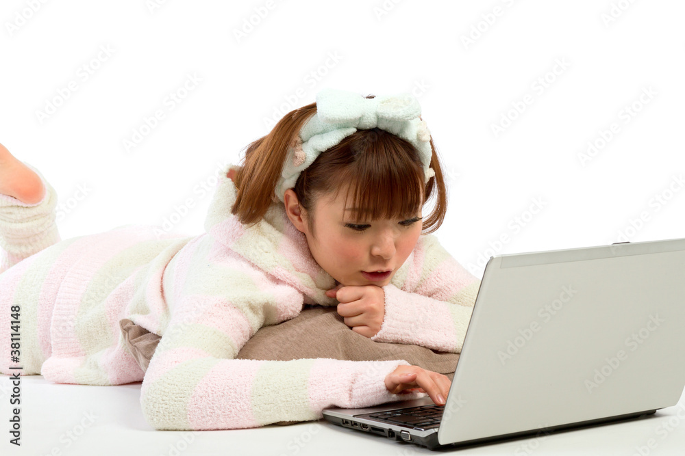 Beautiful asian woman using a laptop computer Beautiful asian woman using a laptop computer