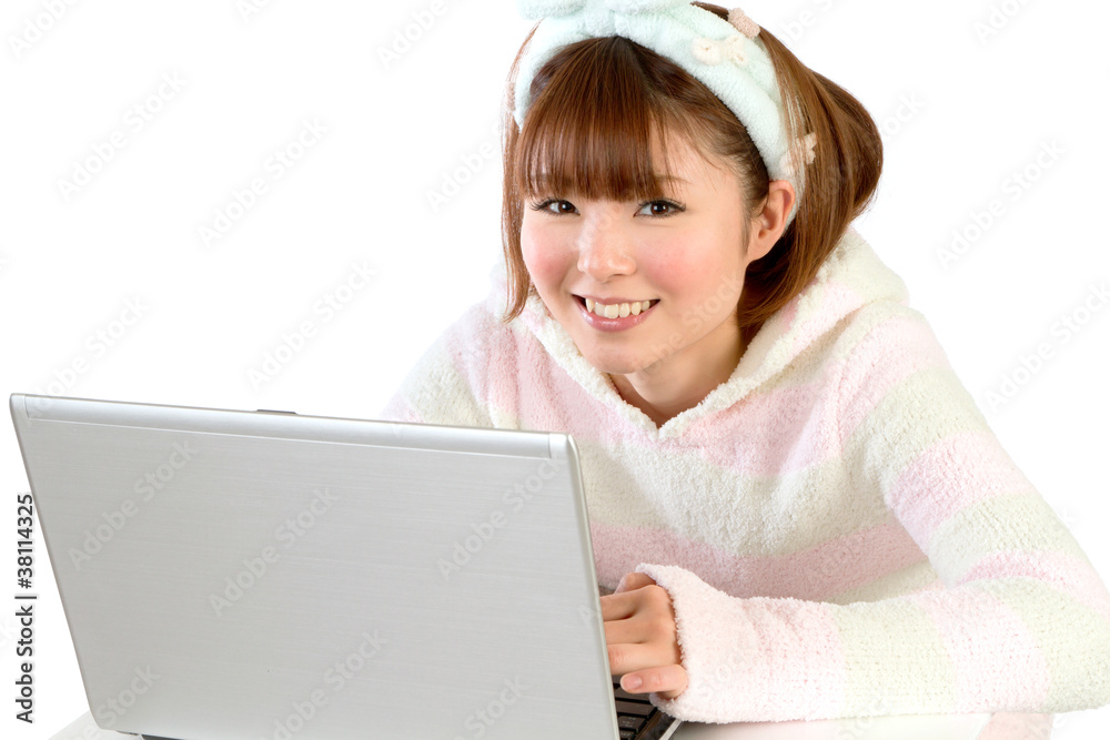 Beautiful asian woman using a laptop computer Beautiful asian woman using a laptop computer