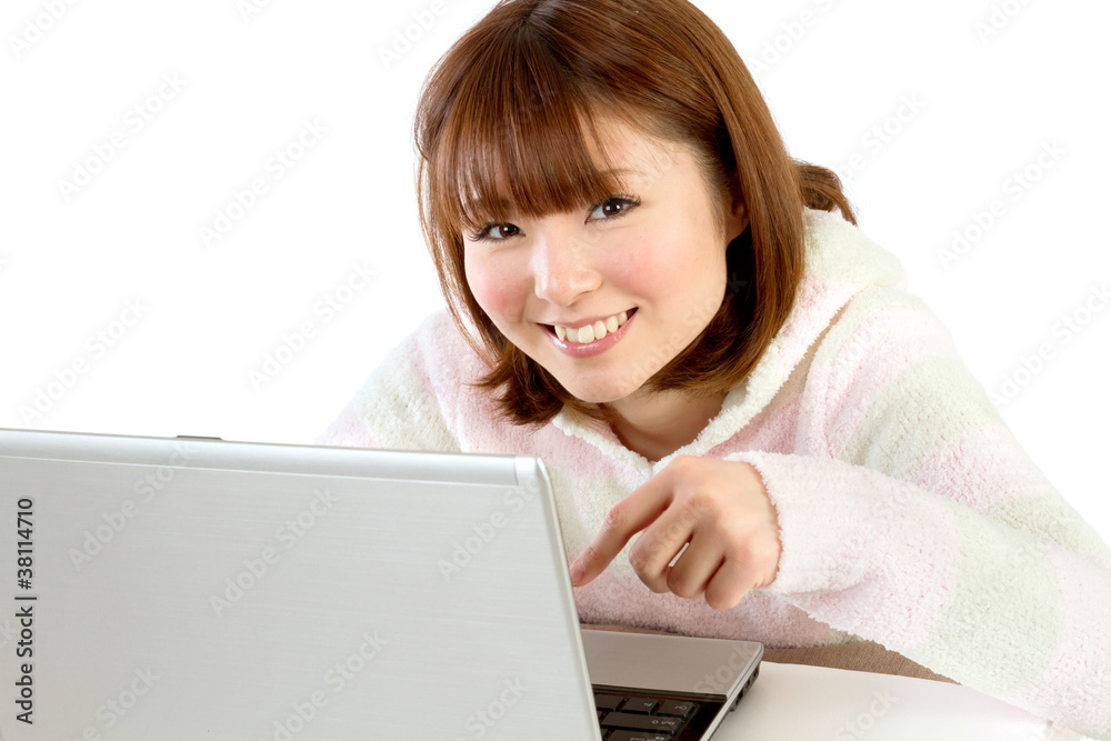 Beautiful asian woman using a laptop computer Beautiful asian woman using a laptop computer