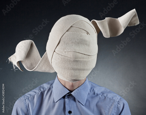 Fotografie, Obraz Portrait of the man with elastic bandage on a head