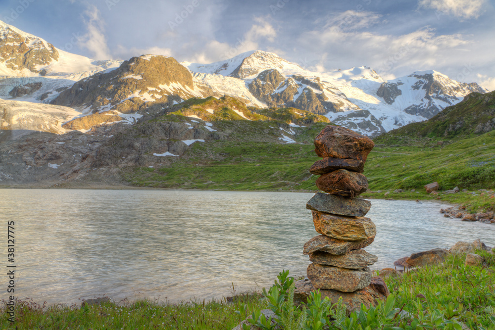 rock cairn mark at glacier lake