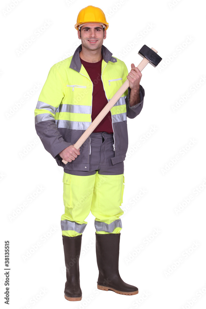 Workman with a sledgehammer Workman with a sledgehammer