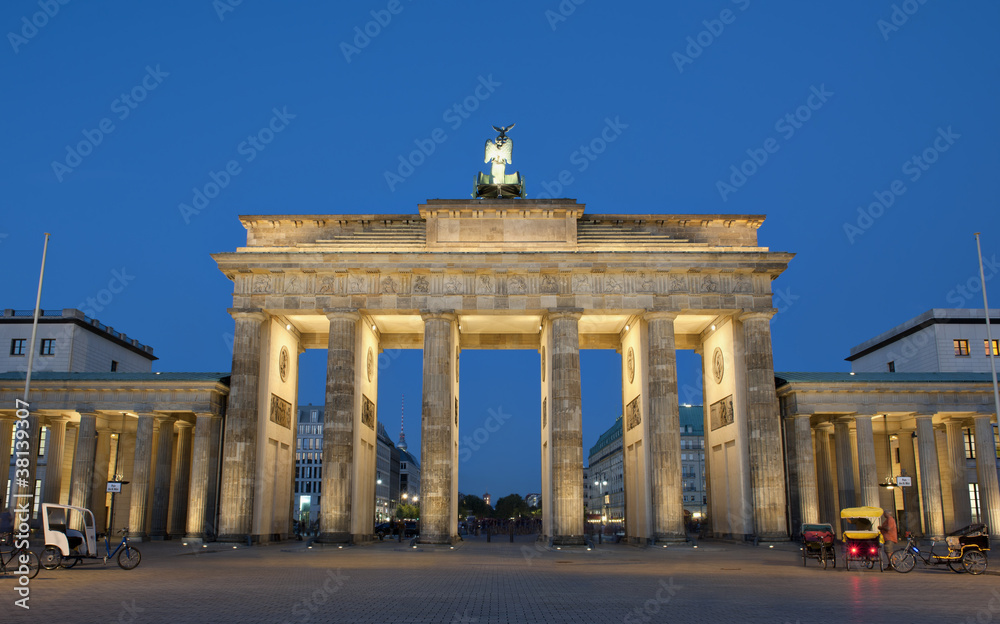 Brandenburg gate illuminated at night in Berlin