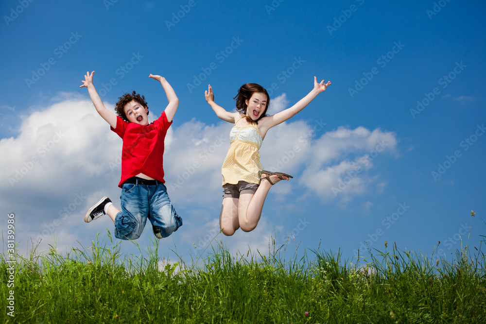 Girl and boy running, jumping outdoor Girl and boy running, jumping outdoor