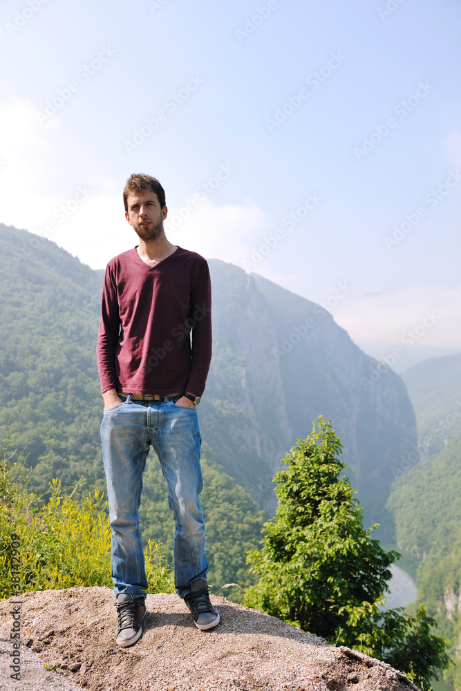 Naklejka premium man jump in nature