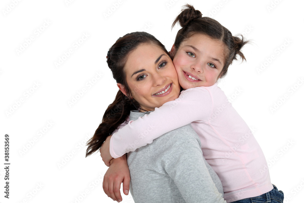 Mother and daughter hugging Mother and daughter hugging