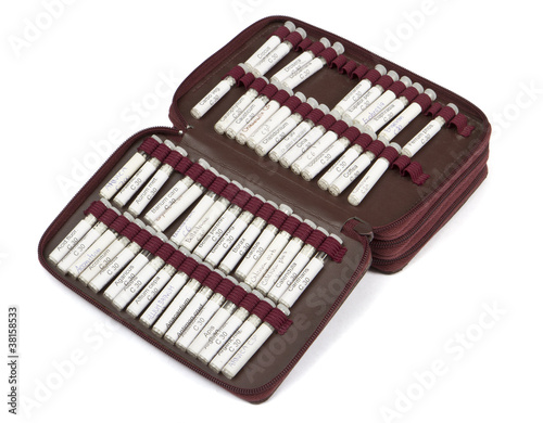 Konstfotografi many homeopathic globule with other midwife equipment
