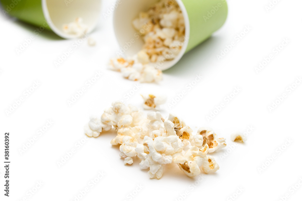 Popcorn in a green paper cup Popcorn in a green paper cup