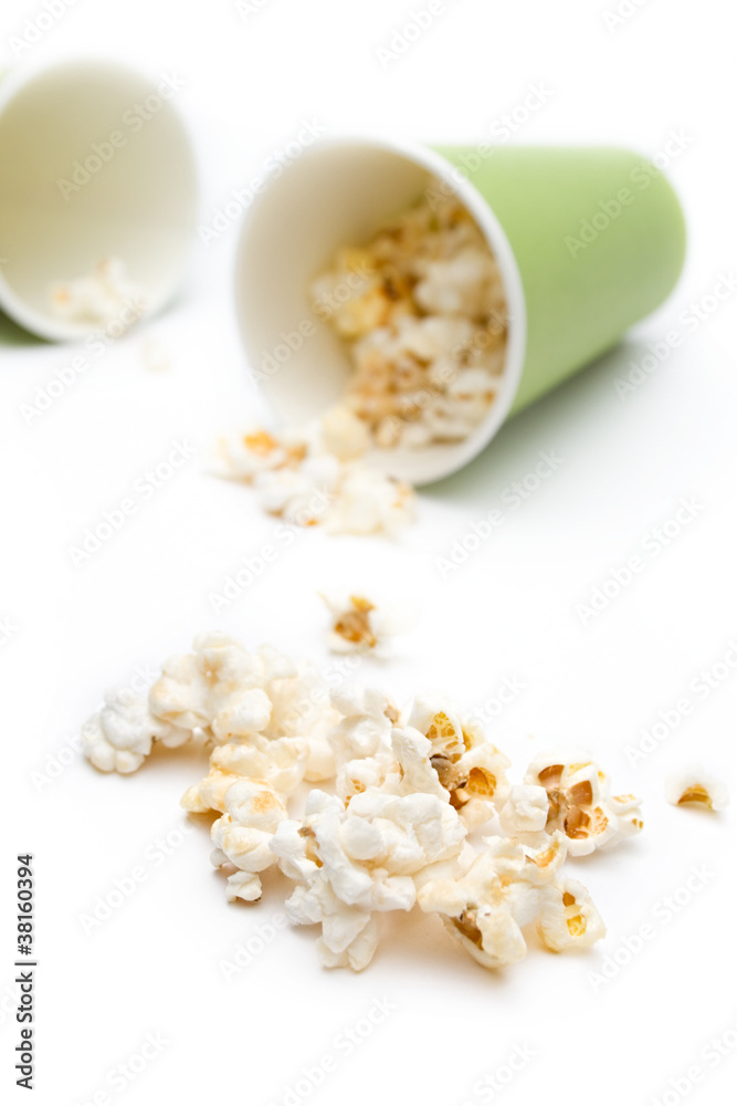 Popcorn in a green paper cup