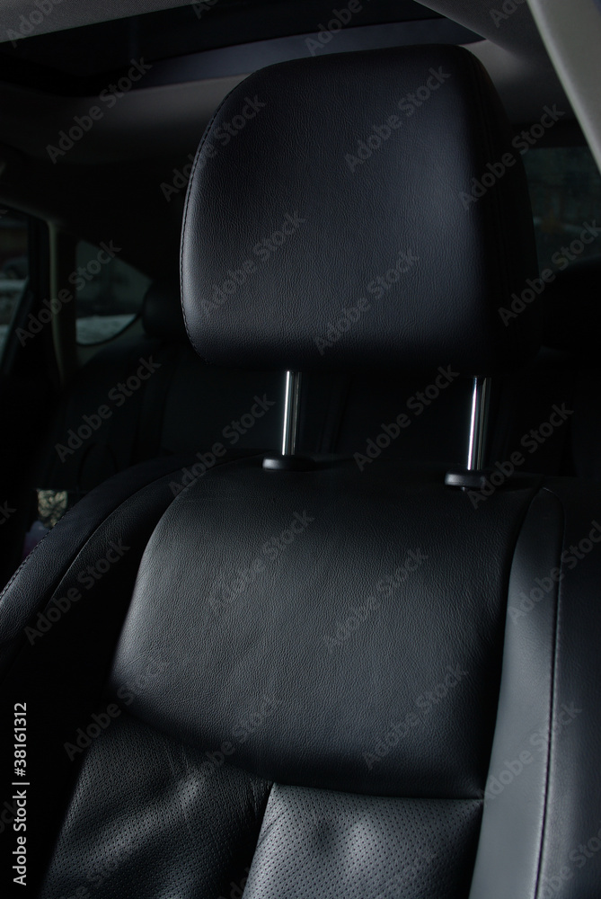 Black leather seat in a car Black leather seat in a car