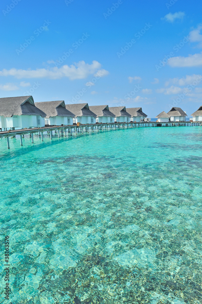 Maldives water villa and blue sea