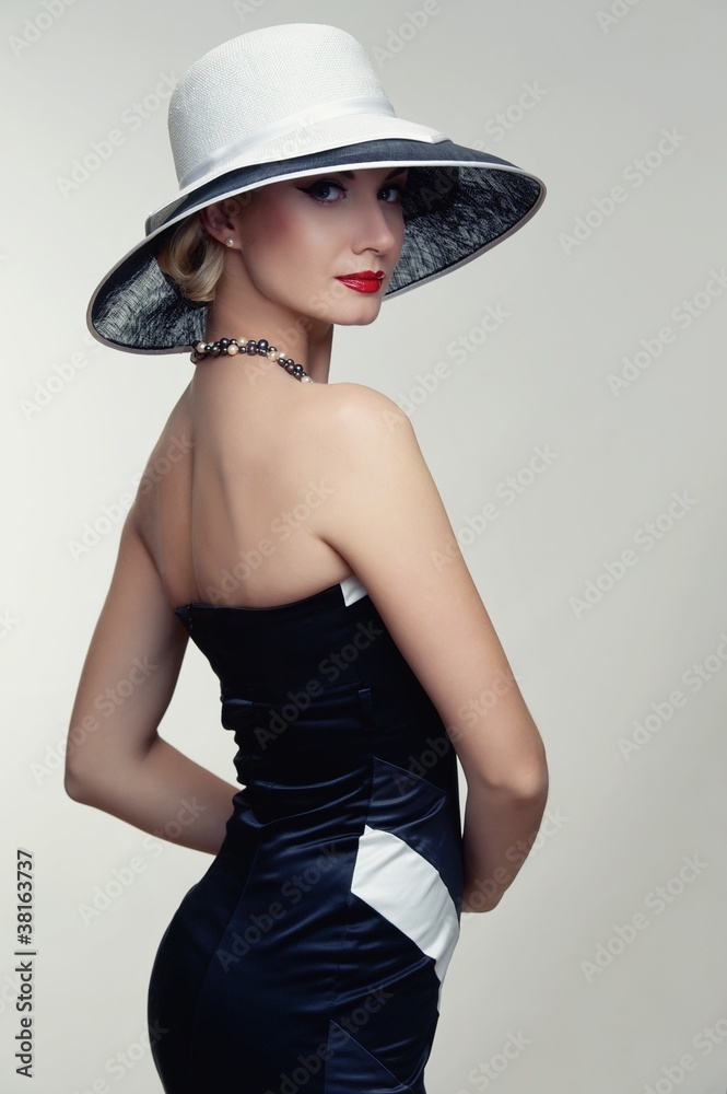 Beautiful woman in hat.