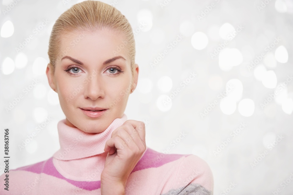 Naklejka premium Beautiful woman in cashmere sweater portrait.