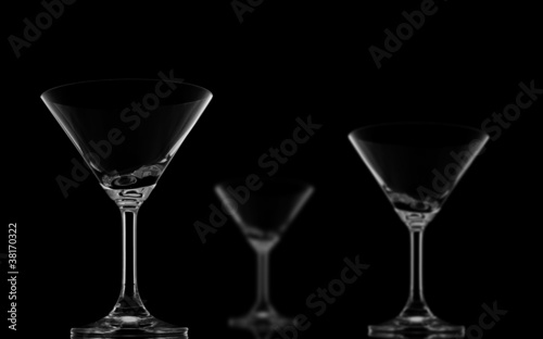 One Sharp and Two Blur Cocktail glasses on black background and