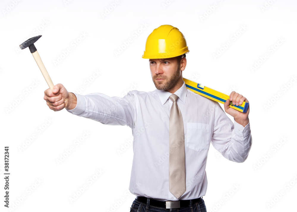 Portrait of handsome engineer with tools