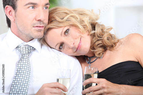 Couple with a glass of champagne
