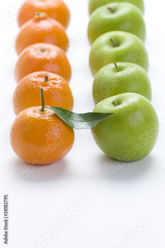 oranges and apples in rows