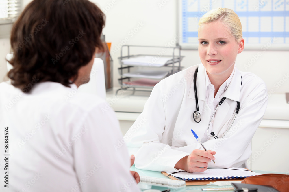 Doctor consulting with a patient Doctor consulting with a patient