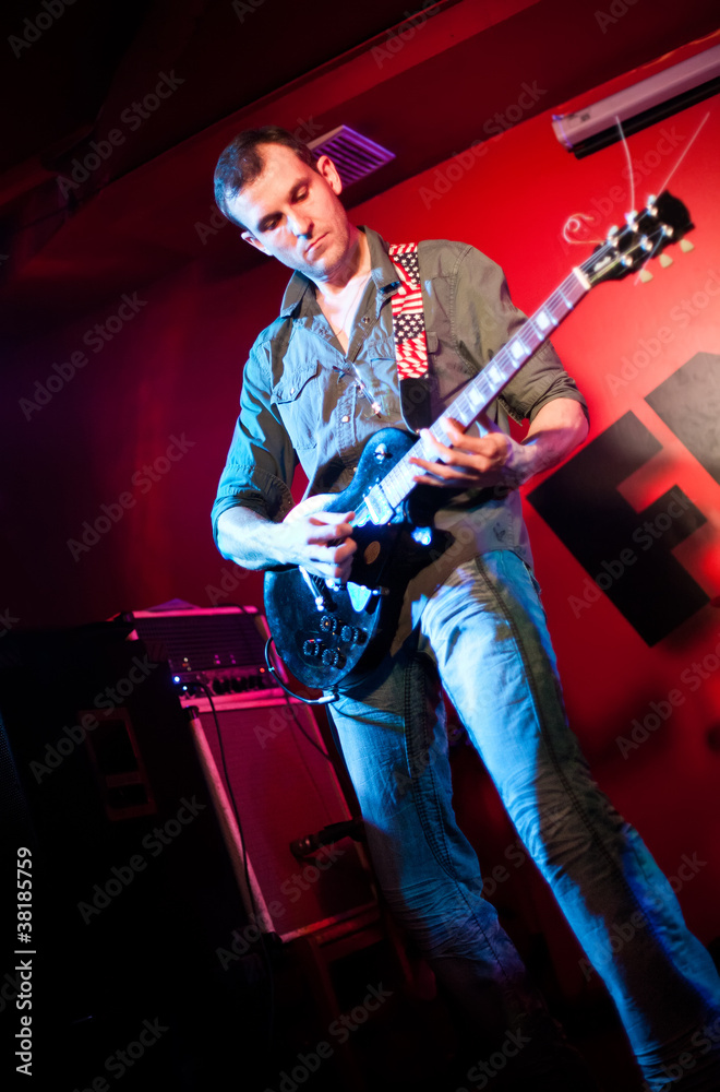 Obraz premium musician plays a guitar