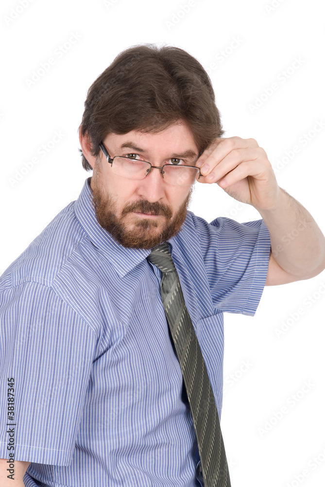 Portrait of a serious young man in glasses
