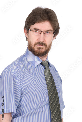 Portrait of a serious young man in glasses © kanzefar