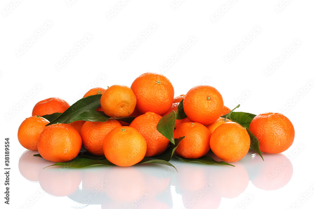 Ripe tasty tangerines with leaves isolated on white Ripe tasty tangerines with leaves isolated on white