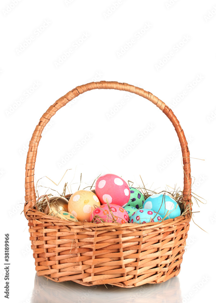 Colorful Easter eggs in the basket isolated on white Colorful Easter eggs in the basket isolated on white