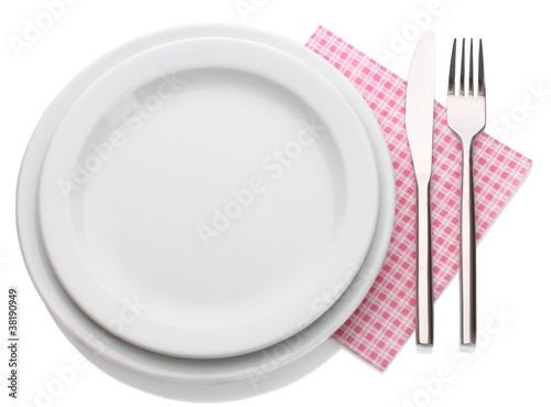 White empty plate with fork and knife isolated on white