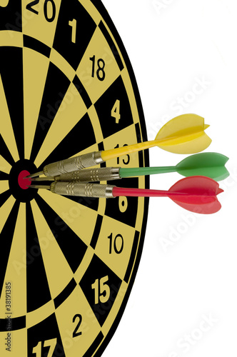 three darts hitting a target