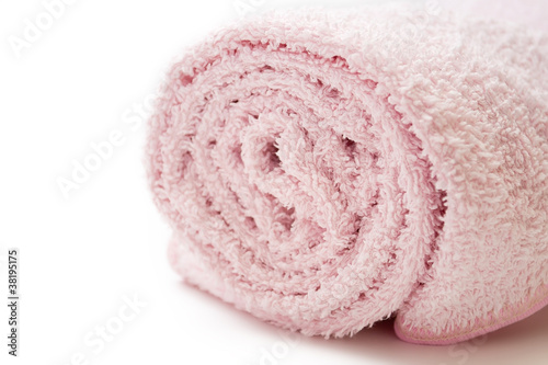 The pink towel on white background