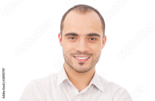 Handsome smiling man. Isolated over white background.