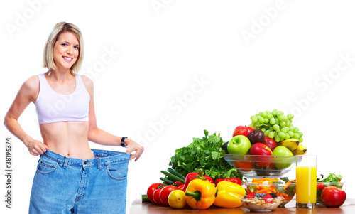Young woman with fruits and vegetables.