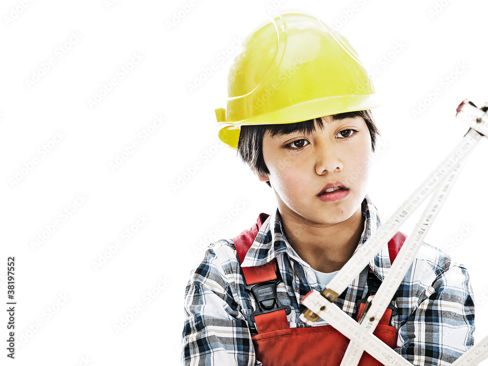 boy wearing construction helmet